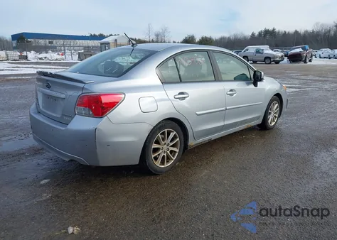 2012 Subaru Impreza 2.0I Premium z USA, uszkodzony, nr VIN JF1GJAB65CH021070